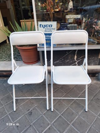 2 Sillas Plegables de Polipiel y Metal unidad 10e