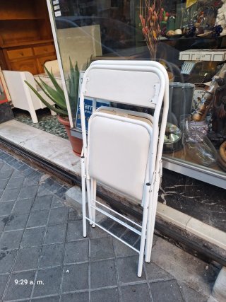 2 Sillas Plegables de Polipiel y Metal unidad 10e