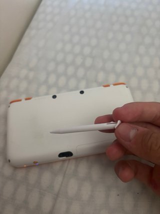 New Nintendo 2DS XL Blanca y Naranja