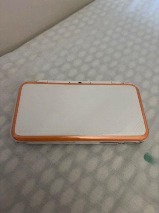 New Nintendo 2DS XL Blanca y Naranja