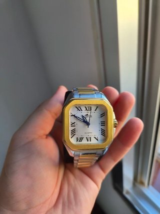 Reloj Lotus Oro y Plata