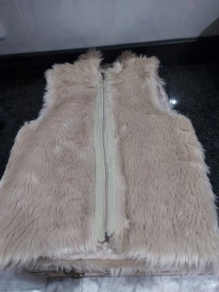 Chaleco de pelo sintético beige