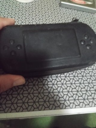 Console Sony PSP nera con custodia e giochi