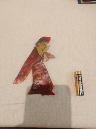 Marioneta de sombra de mujer con abanico