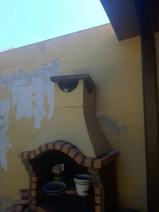 Barbacoa de Piedra con Chimenea