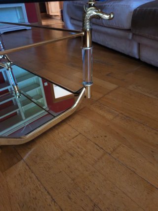 Mesa de centro cristal y metal dorada