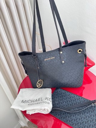 Bolso Michael Kors azul con monedero