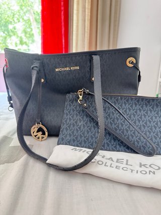 Bolso Michael Kors azul con monedero