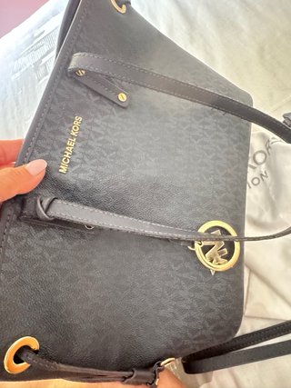 Bolso Michael Kors azul con monedero