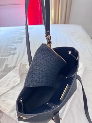 Bolso Michael Kors azul con monedero