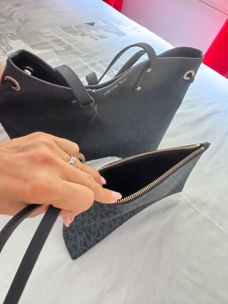 Bolso Michael Kors azul con monedero