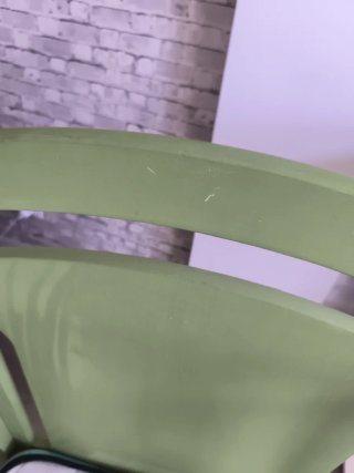 Cuna de bebé verde con osito