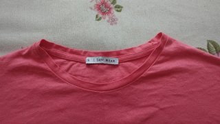 Camiseta rosa anudada manga corta