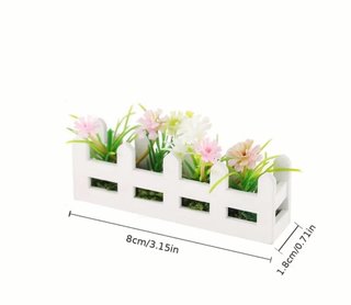 Imán decorativo, jardinera con flores.