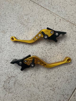 Manetas de moto doradas ajustables