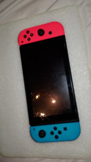 Nintendo Switch  y una funda
