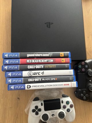 PS4 Slim 1TB Nera + 6 Giochi + 2 Controller