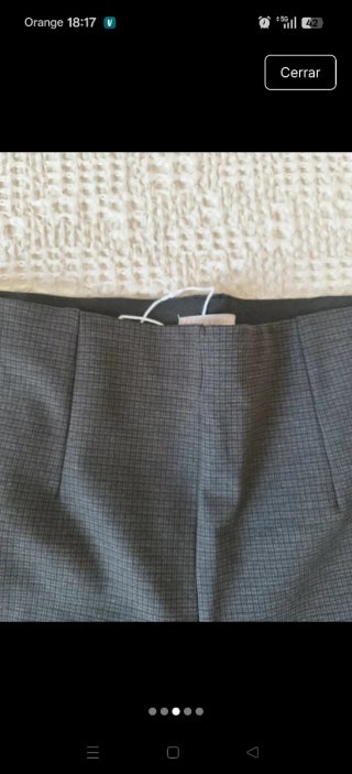 Pantalón Sfera gris con cremalleras doradas