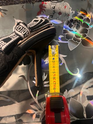 Tacchi Dior neri e oro