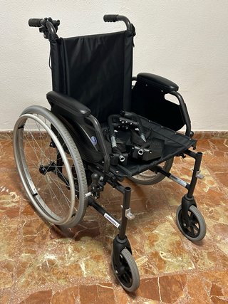Silla de ruedas plegable con motor.Perfecto estado