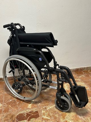 Silla de ruedas plegable con motor.Perfecto estado