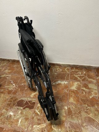 Silla de ruedas plegable con motor.Perfecto estado