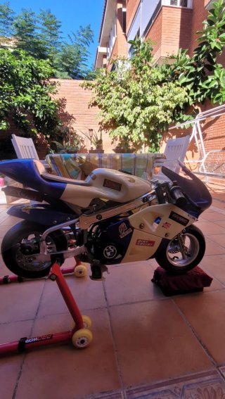 Mini moto infantil azul y blanca