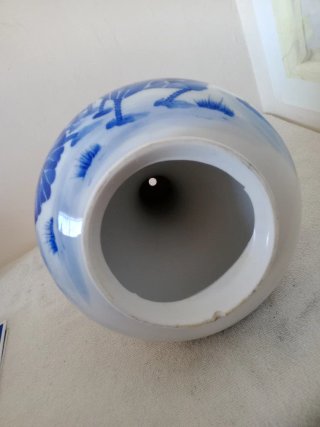 Porrón o botijo de cerámica azul y blanco