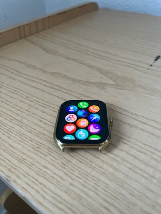 Reloj de alta gama dorado y marrón