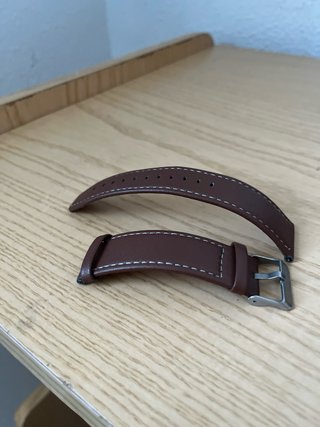 Reloj de alta gama dorado y marrón