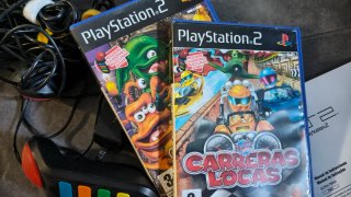 PS2 Slim Nera + Accessori e Giochi