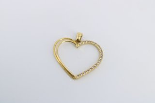 Colgante Corazón Oro 18K con piedras blancas