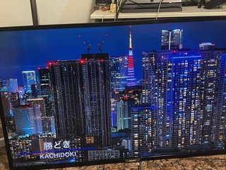 TV Philips 43" 4K UHD mando y soporte
