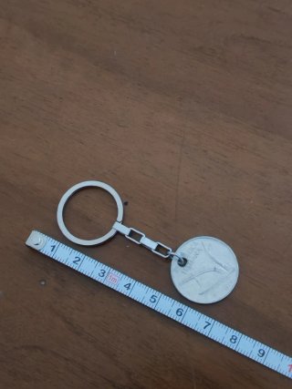 Portachiavi in acciaio con 10 Lire autentica