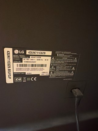Smart TV LG Negra con soporte pared