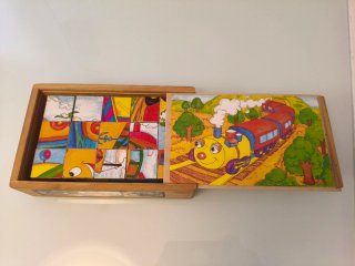 Puzzle de madera con cubos, temas transportes