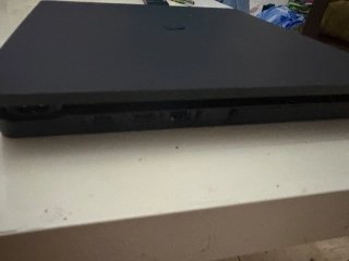 PS4 Slim + 2 controller + 8 giochi