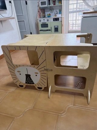 Torre de aprendizaje madera león