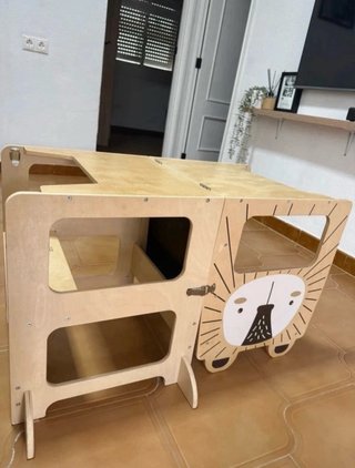 Torre de aprendizaje madera león