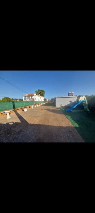 Terreno con caseta