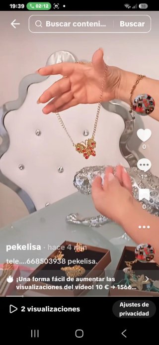 Collar y pulsera de oro con piedras rojas