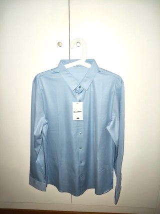 Camisa Zucchini Azul Talla S y blanca talla M.