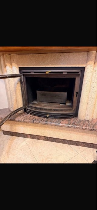 Chimenea curva madera y granito