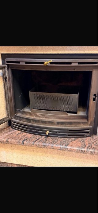 Chimenea curva madera y granito