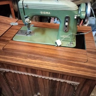 Máquina de coser Sigma verde