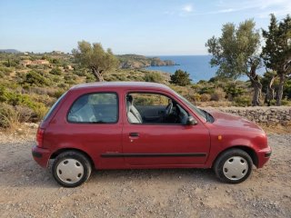 Nissan Micra 1996 color granate 1000cc