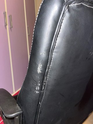 Silla de oficina negra de piel sintética