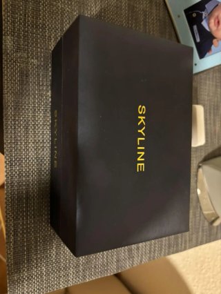 Reloj Skyline Negro y Dorado
