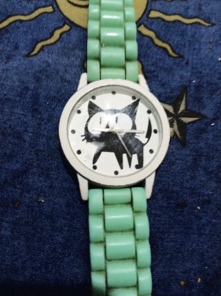 Reloj con diseño de gato