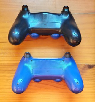 PlayStation 4 con 2 mandos y accesorios FW 11.02